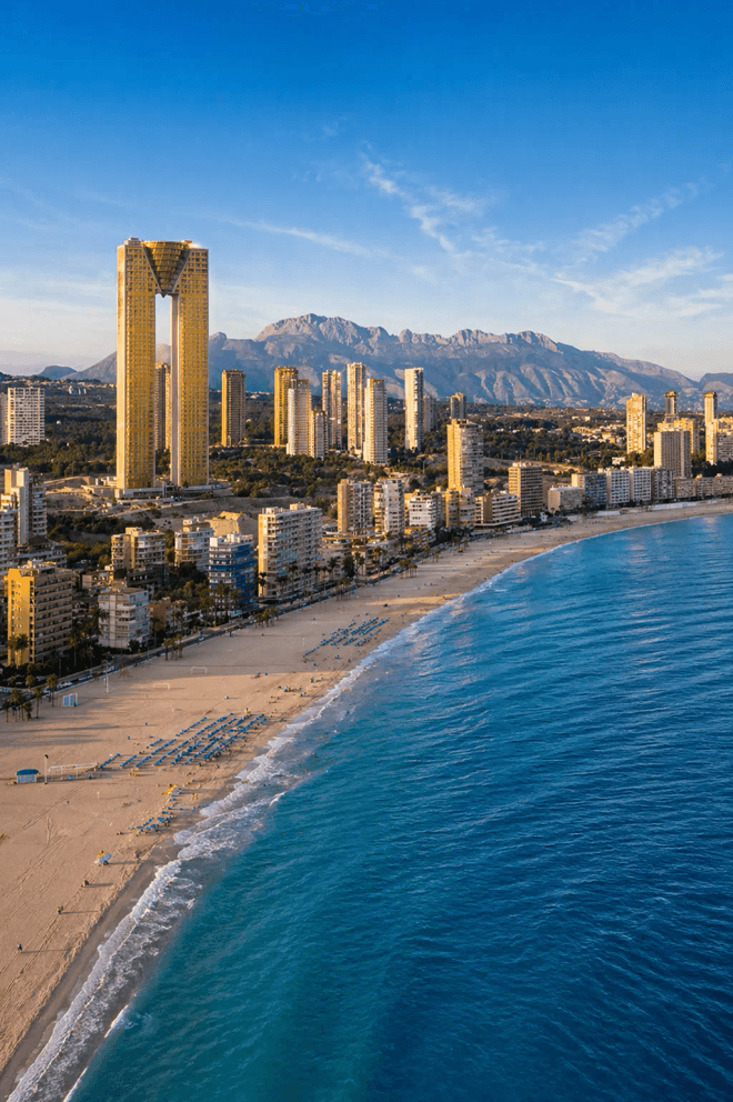 Aerial view of Benidorm beach and skyline with Intempo towers and mountains on the Costa Blanca